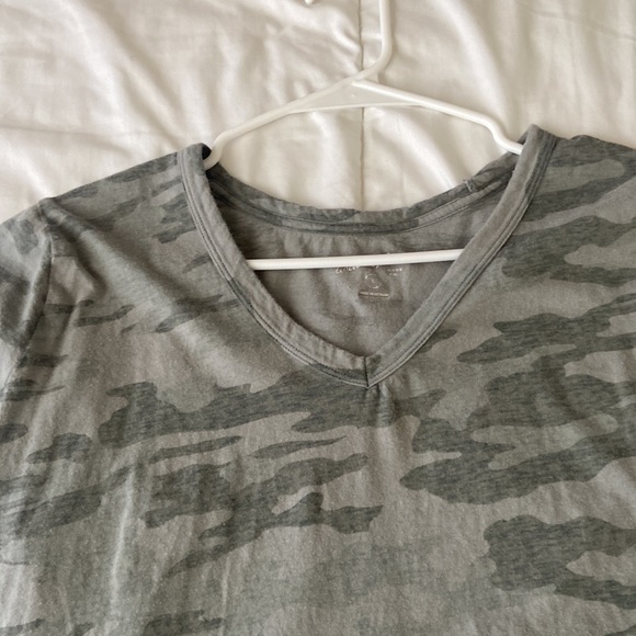 A large sized green camo v-neck cut shirt. - Picture 3 of 4